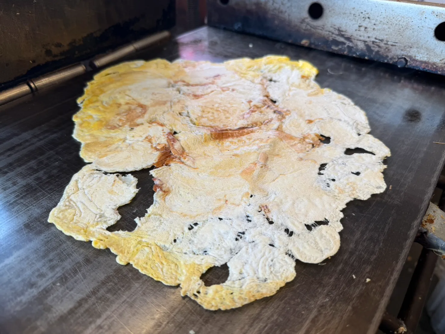 鉄板で焼かれるいか焼き